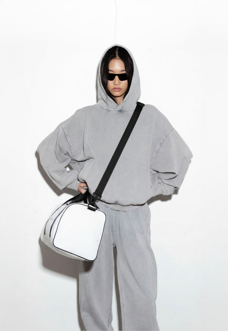 BECCA Q duffle bag, worn as crossbody